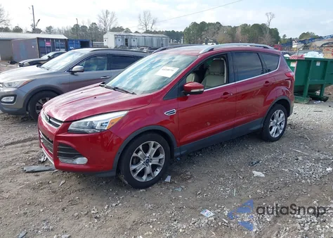 2016 Ford Escape Titanium из США, поврежденный, VIN 1FMCU0JXXGUC09404
